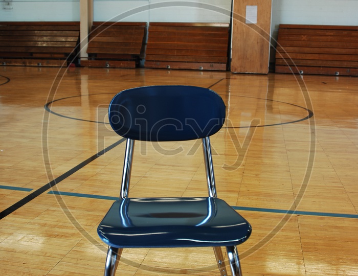 A chair in a basketball court