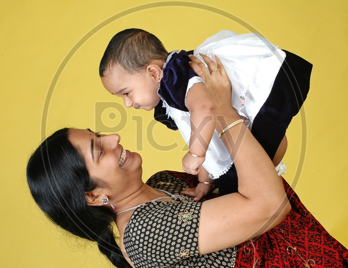 Mother and Baby girl in black and white frock