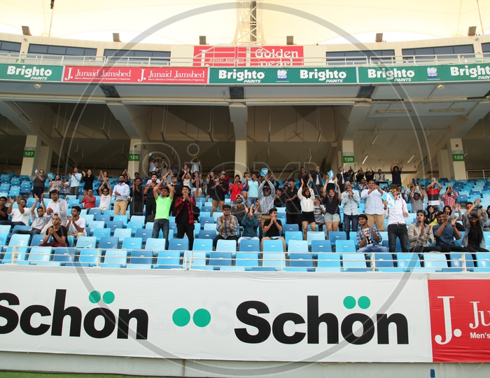Visitors Or Crowd In Cricket Stadium Stands