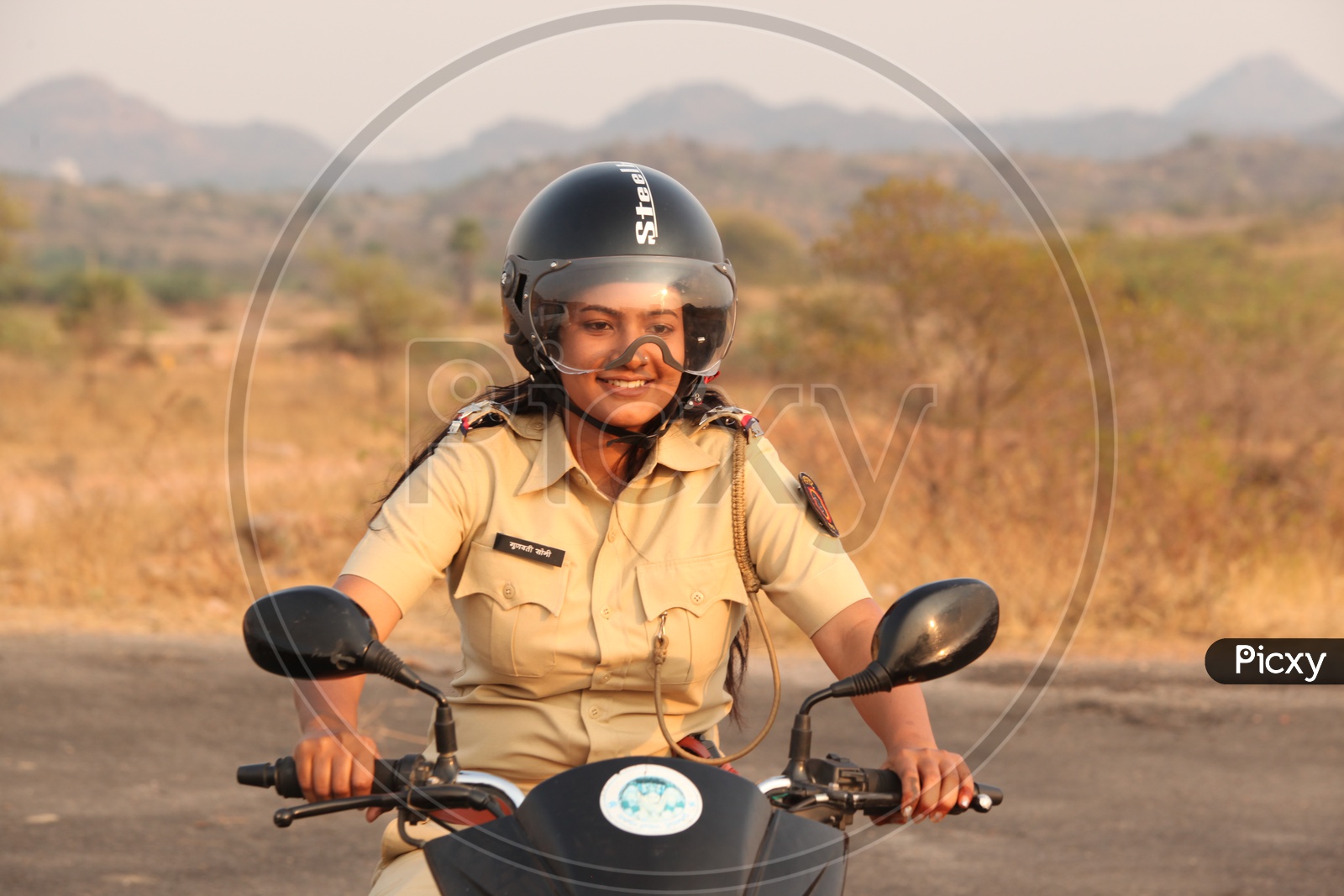 Woman Or Lady Police Driving Bike