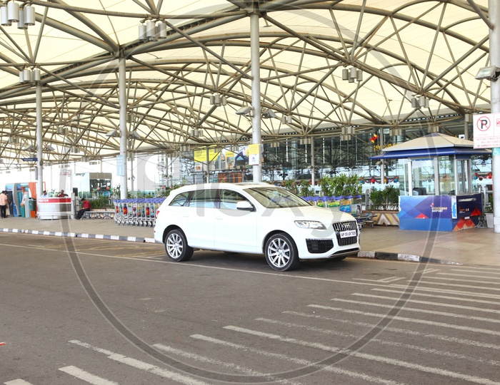 Cars At The Airport Entrance Gate