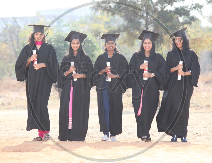 Young Indian Girls On Graduation Day Dress
