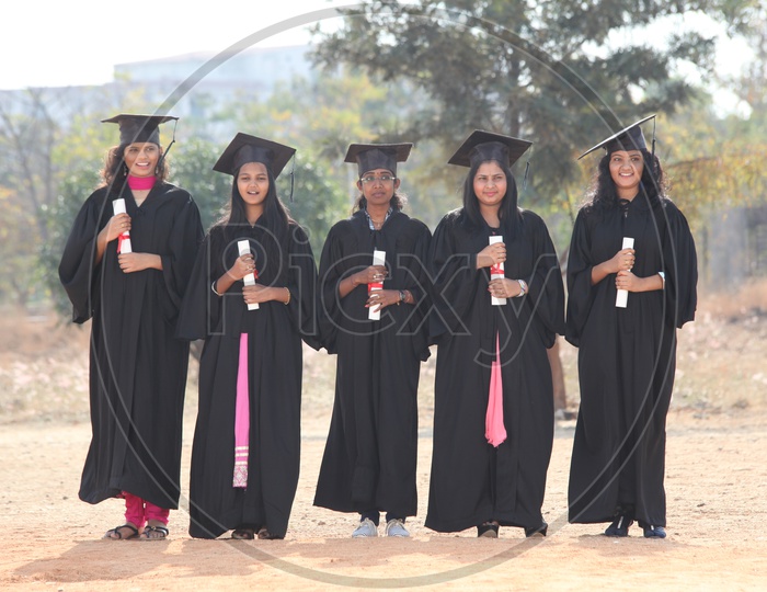 Indian Young Girls Wearing Graduation Dresses