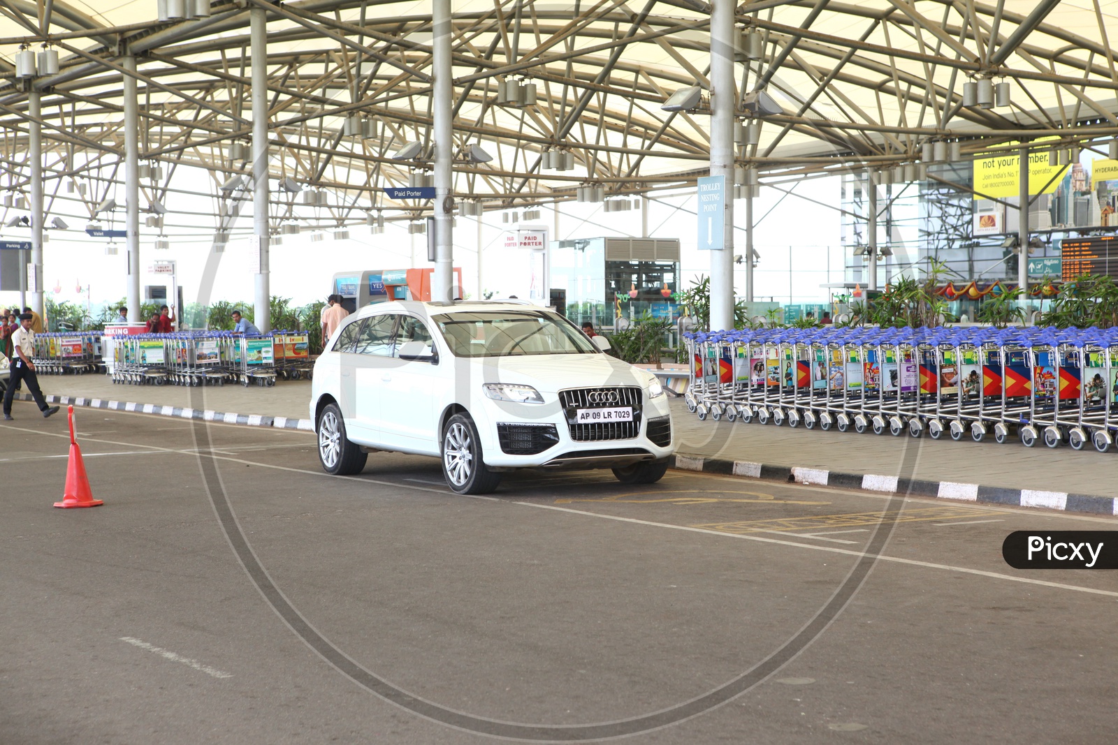 Cars At The Airport Entrance Gate