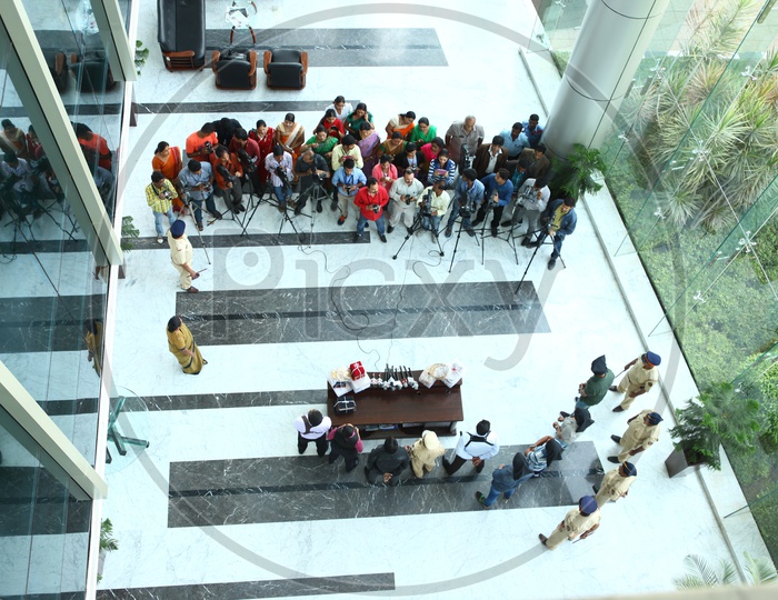 Aerial View Of a Press Meet In A Office