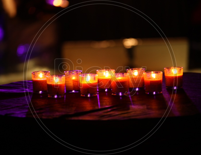 Cup Candles On a Table