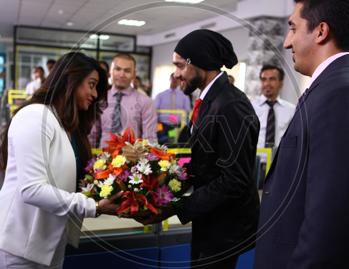 Office Staff Welcoming Young lady Entrepreneur