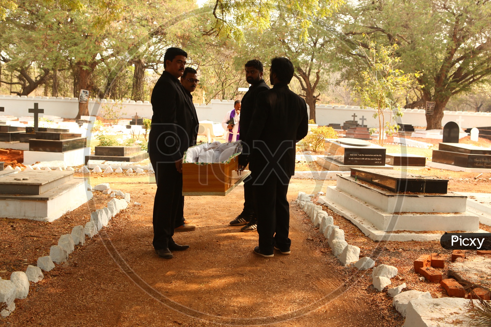 Men Carrying Funeral Box Or Coffin Box