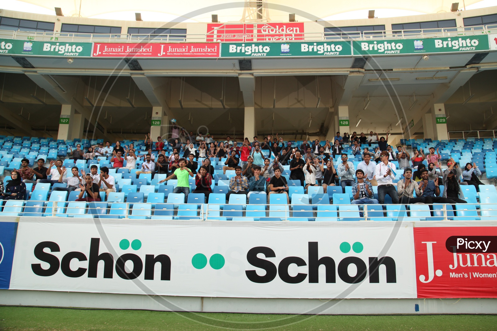 Crowd Cheering from Stands In a Cricket Stadium