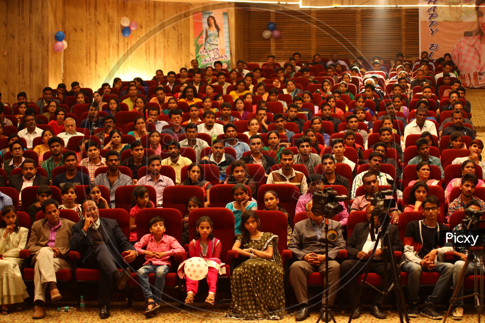 Invities and Media People In a Auditorium