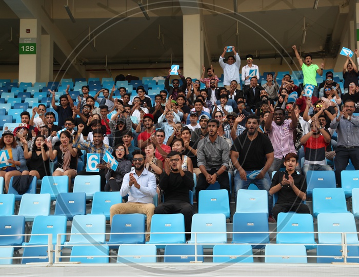 Crowds Cheering In Cricket Stadium Stands