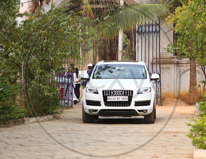 Audi Car Coming Through a Gate