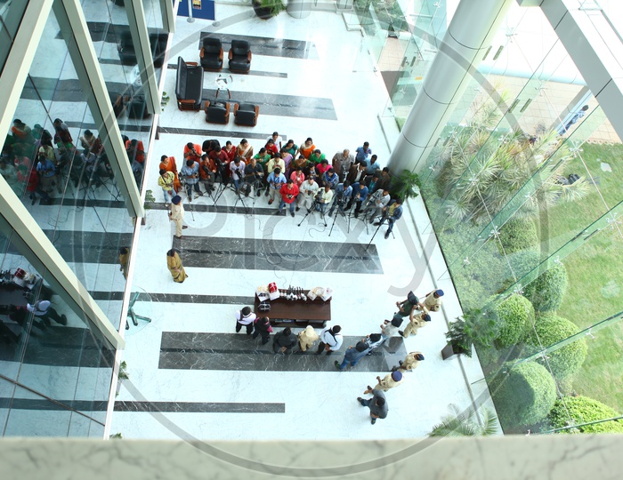 Aerial View Of a Press Meet In A Office