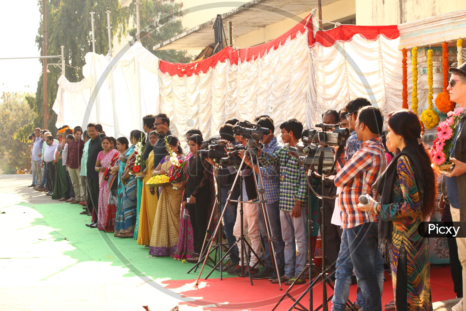 Media Covering an Dignitary Entry  to a Event