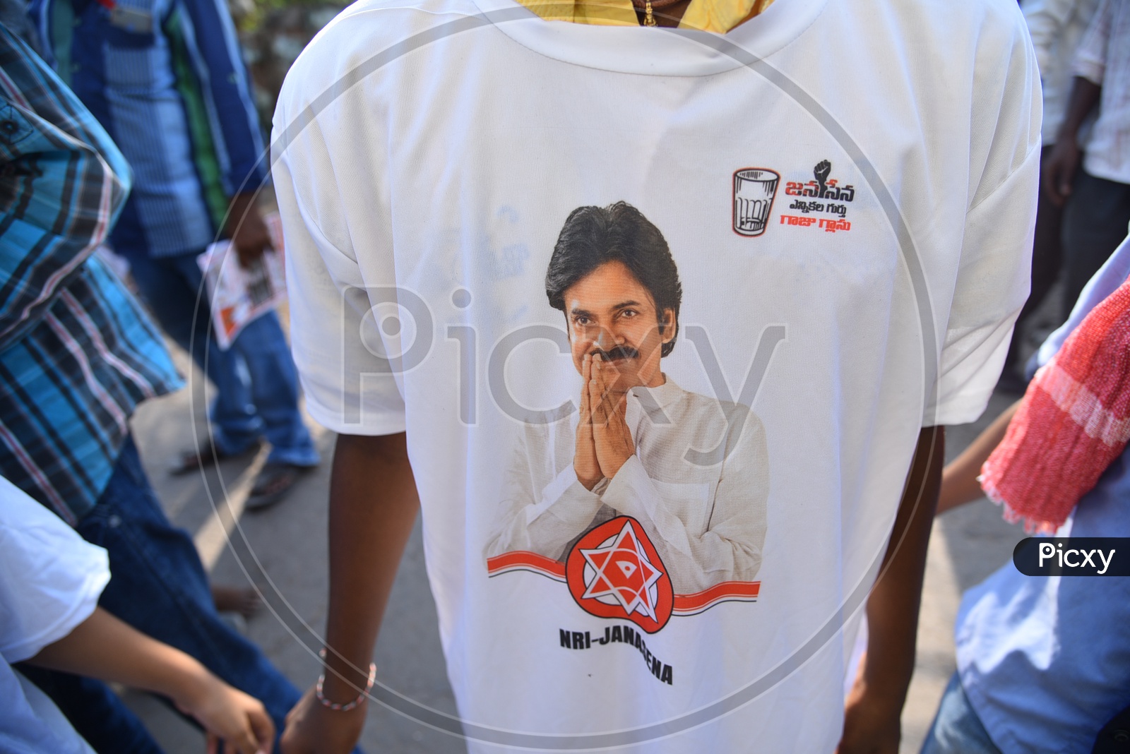 Janasena Party Supporters Wearing Tshirts During Election Campaign Rally