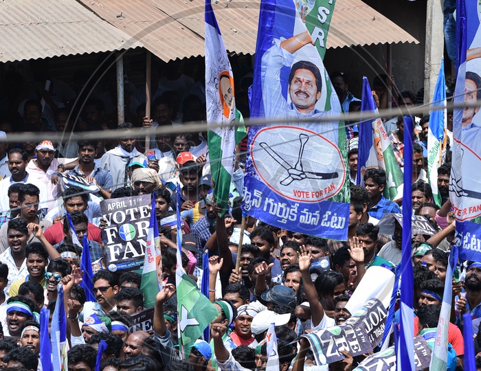 YSRCP Party Supporters With Party Flags During Election Campaign Rally