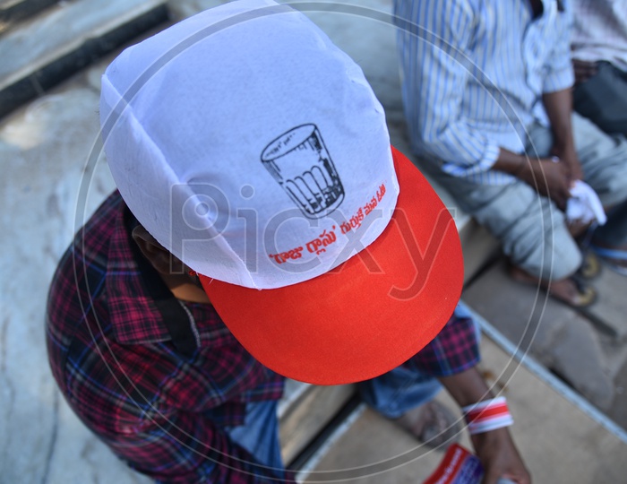 Janasena Party Supporters Wearing Party Caps During Election Campaign Rally