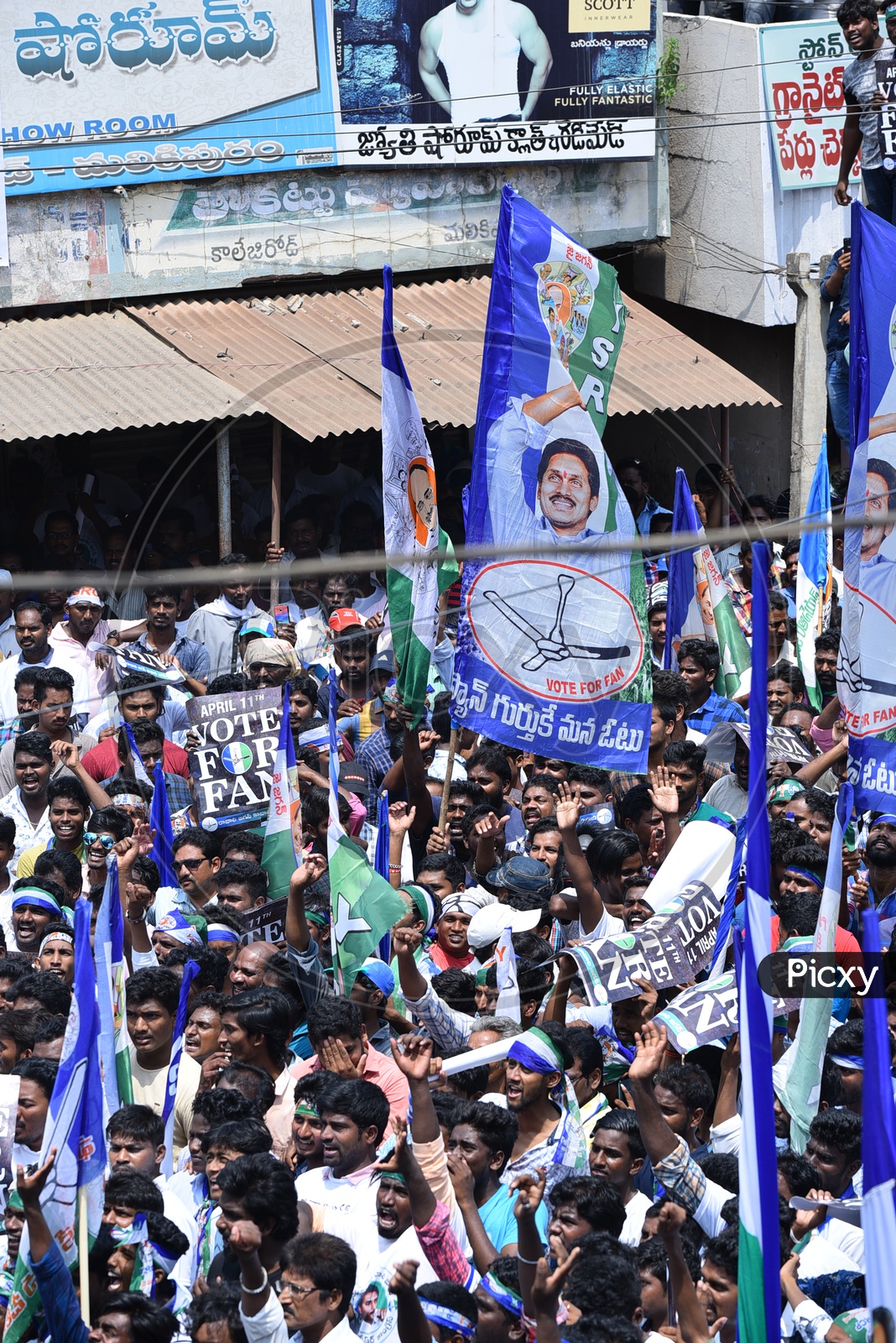 YSRCP Party Supporters With Party Flags During Election Campaign Rally