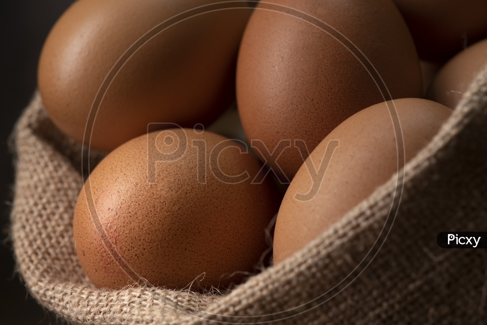 Fresh Brown Eggs in Sack Closeup