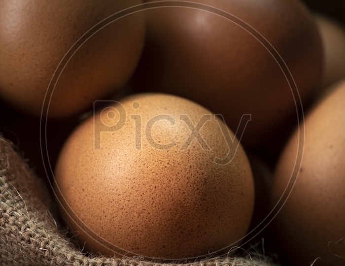 Fresh Brown Eggs in Sack Closeup