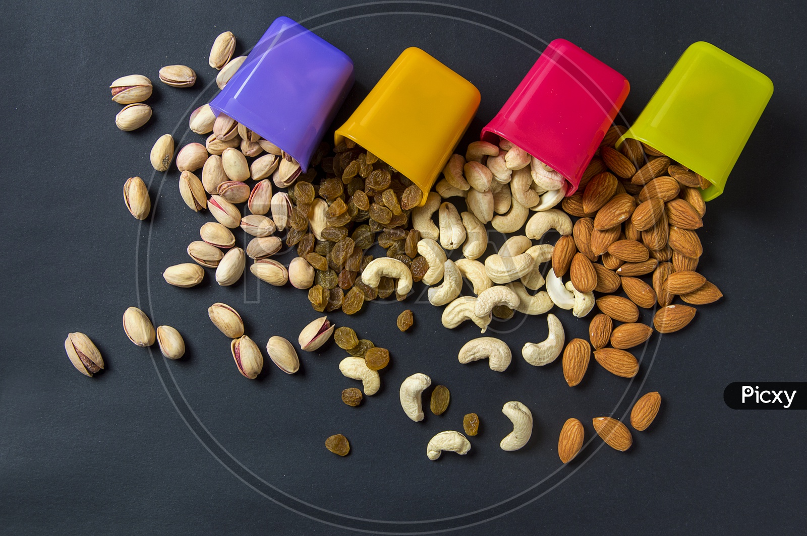 Healthy Mix Dry Fruits and Nuts on dark background