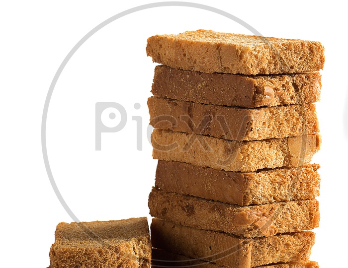 Indian Roasted Bread Or Rusk  , A Tea Time Snack  On an Isolated White Background