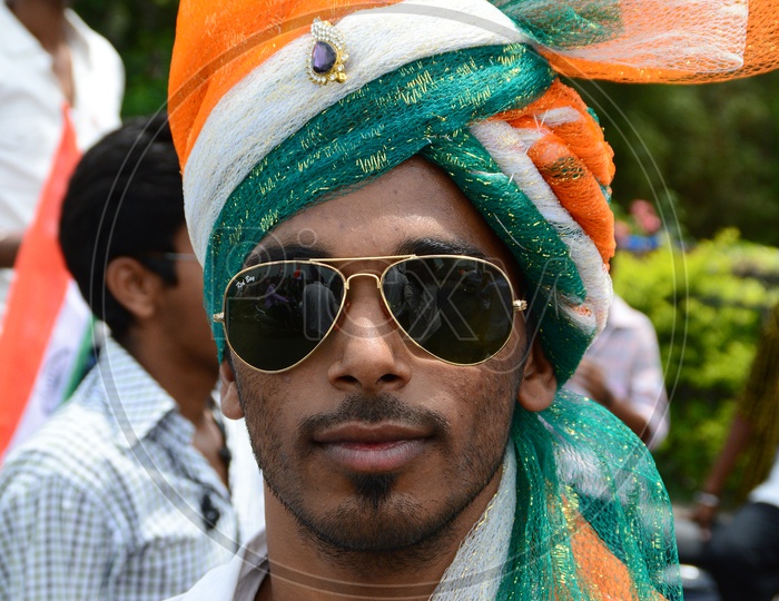 An Indian Man Wearing Indian National Flag Tri Color Turban
