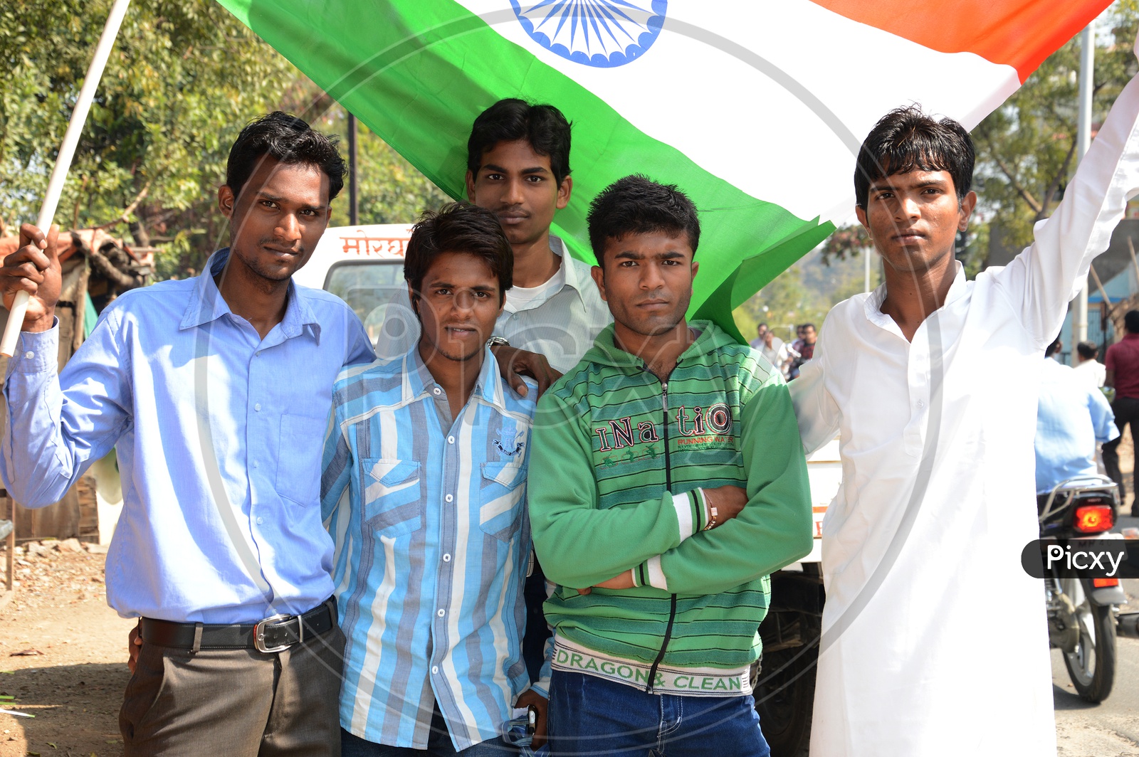 Young Indian People With Indian National Flag ( Tri-Color ) Celebrating Independence Day