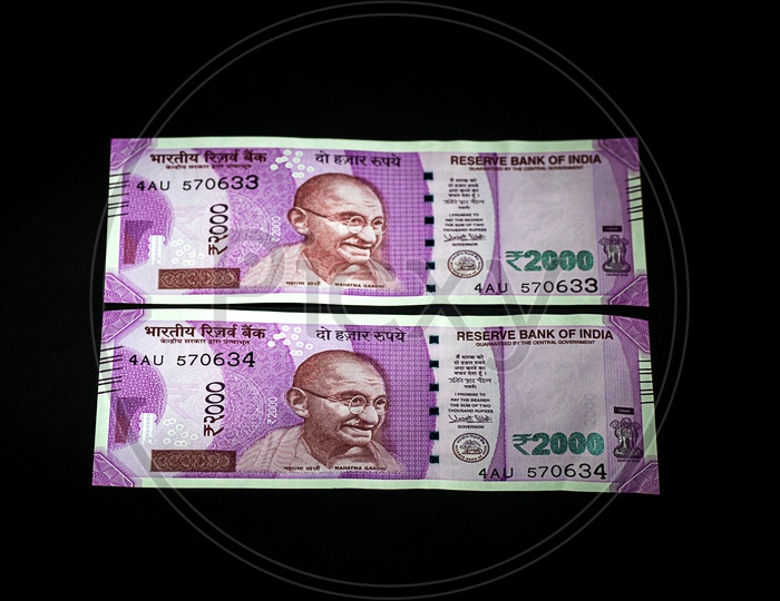 Indian New Currency Note Of 2000 Rupees On An Isolated Black  Background