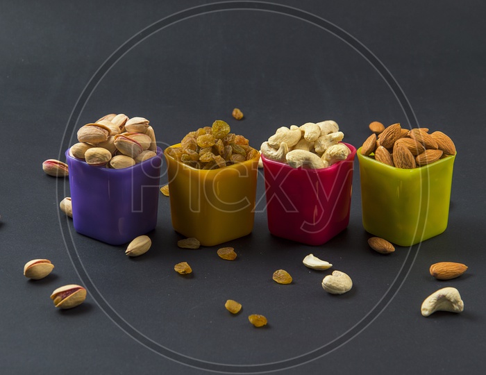 Healthy Mix Dry Fruits and Nuts on dark background