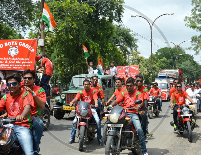 Indian Young People Celebrating Independence Day As a Bike Rally Waving The Indian National Flag