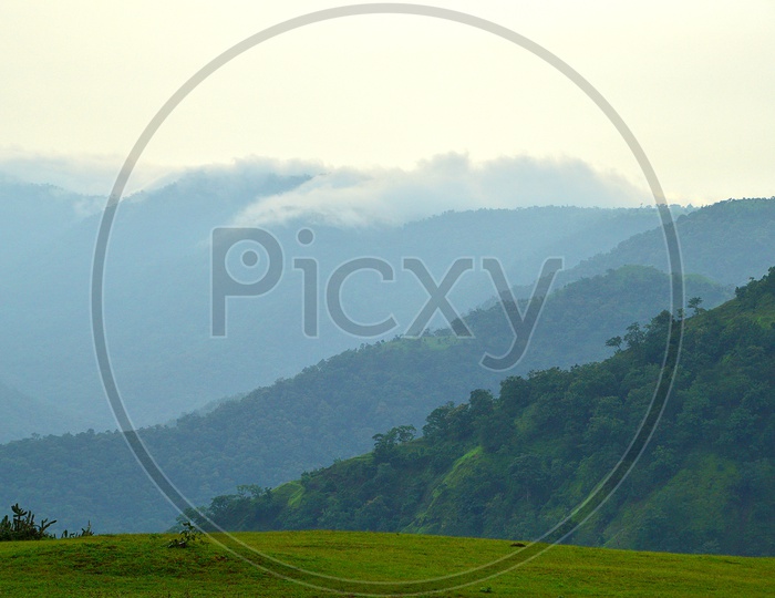 A Landscape of hills covered with mist