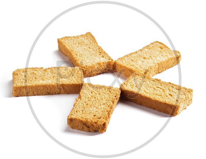 Indian Roasted Bread Or Rusk  , A Tea Time Snack  On an Isolated White Background