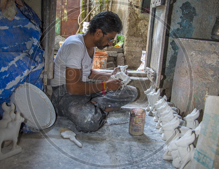 Artists Making Indian Holy Cow Idols In Workshops For Ganesh Festival