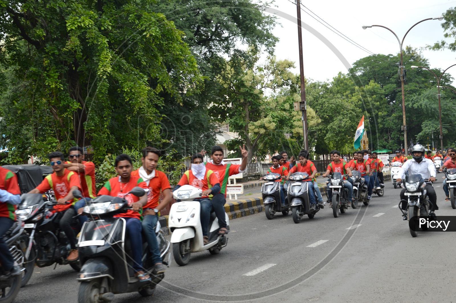 Indian Young People Celebrating Independence Day As a Bike Rally Waving The Indian National Flag
