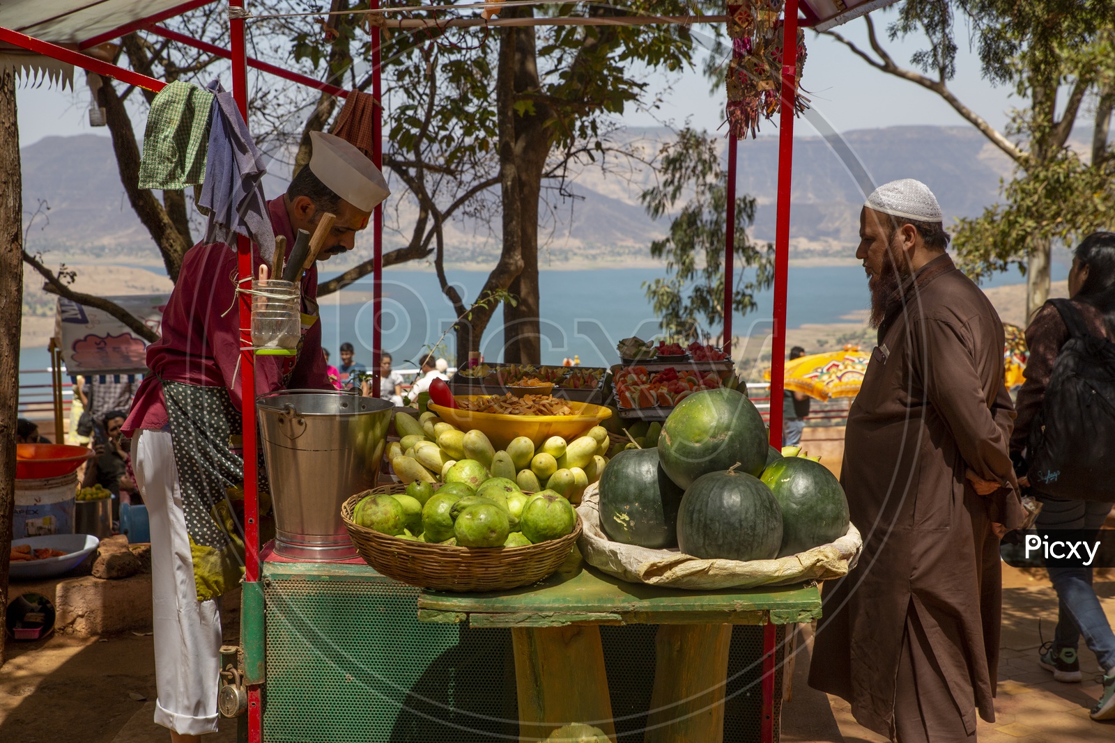 Man selling fruits near Parsi point, Panchgani