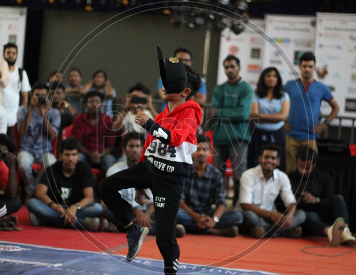 Child artist performing dance