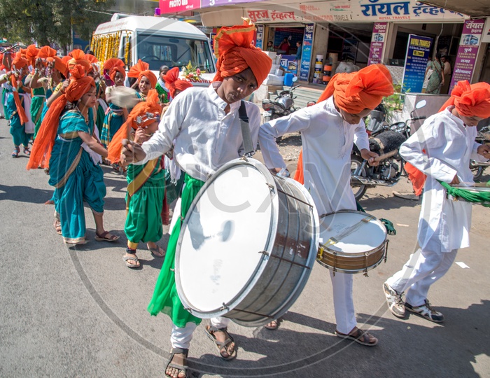 An Indian Drum Artist Playing Drums In a Road Rally On the Occasion Of Republic Day