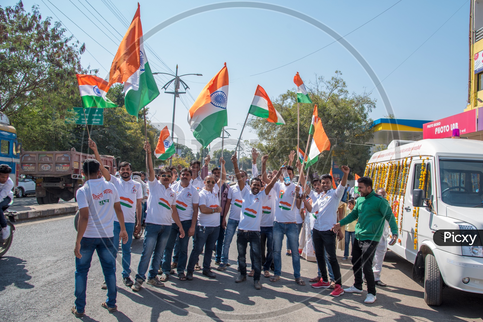 Indian Youth Waving The Indian National Tri Color Flag in a Road Rally on the Occasion Of  Republic Day Celebrations