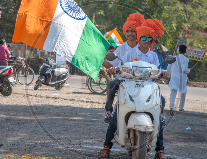 Indian People Waving The Indian National Tri Color Flags On The Indian Streets For Republic Day
