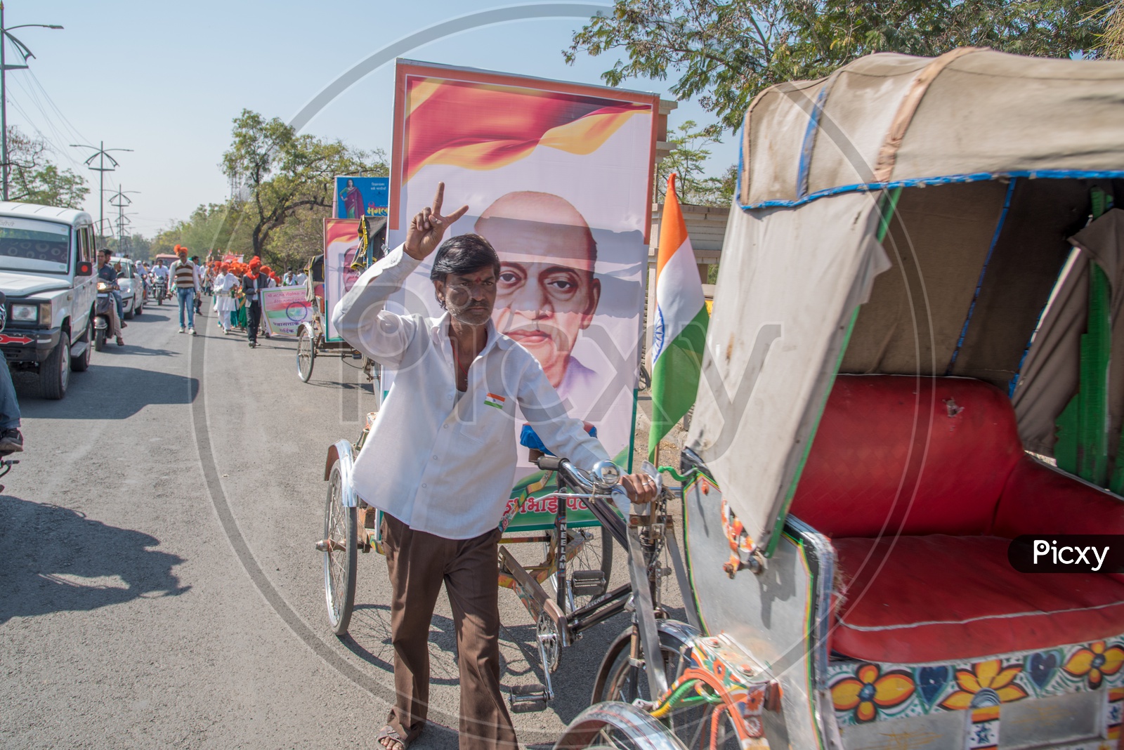 Indian Rickshaw Pullers Carrying The Freedom Fighters Photo Frames in Rickshaws On The Streets For Republic  Day
