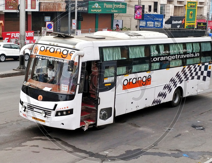 Orange travels sleeper bus