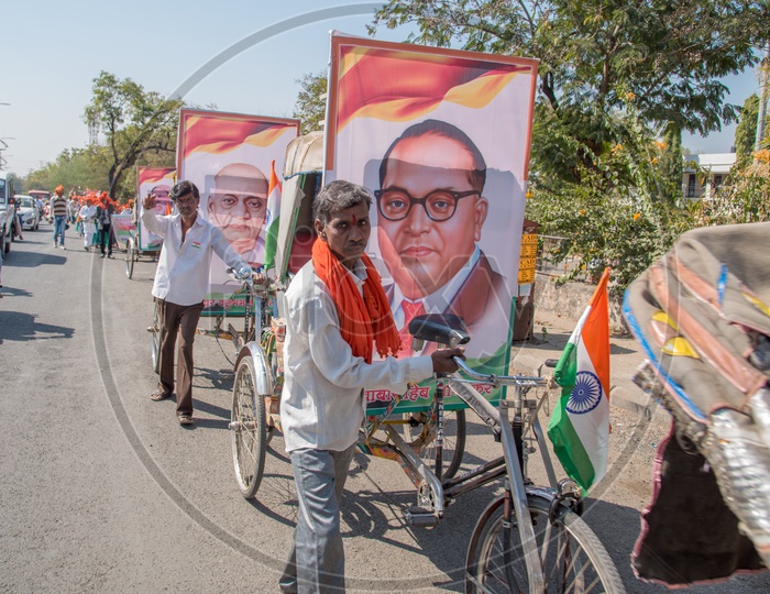 Indian Rickshaw Pullers Carrying Dr. B R Ambedkar Photo Frames in Rickshaws On The Streets For Republic  Day