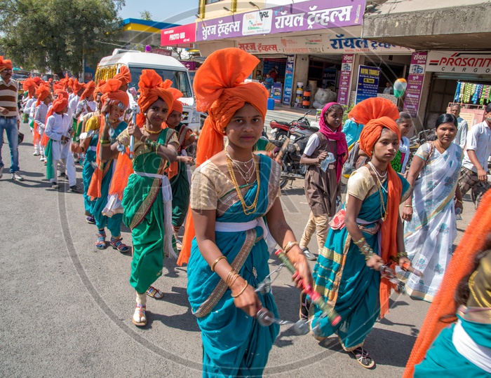 Indian Children Playing Dhandiya or Kolattam in a Road Show on the Occasion Of Republic day On India Streets