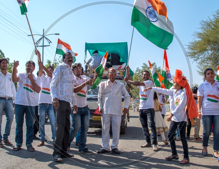 Indian Youth Waving The Indian National Tri Color Flags In a Road Rally On Occasion Of Republic Day Celebrations