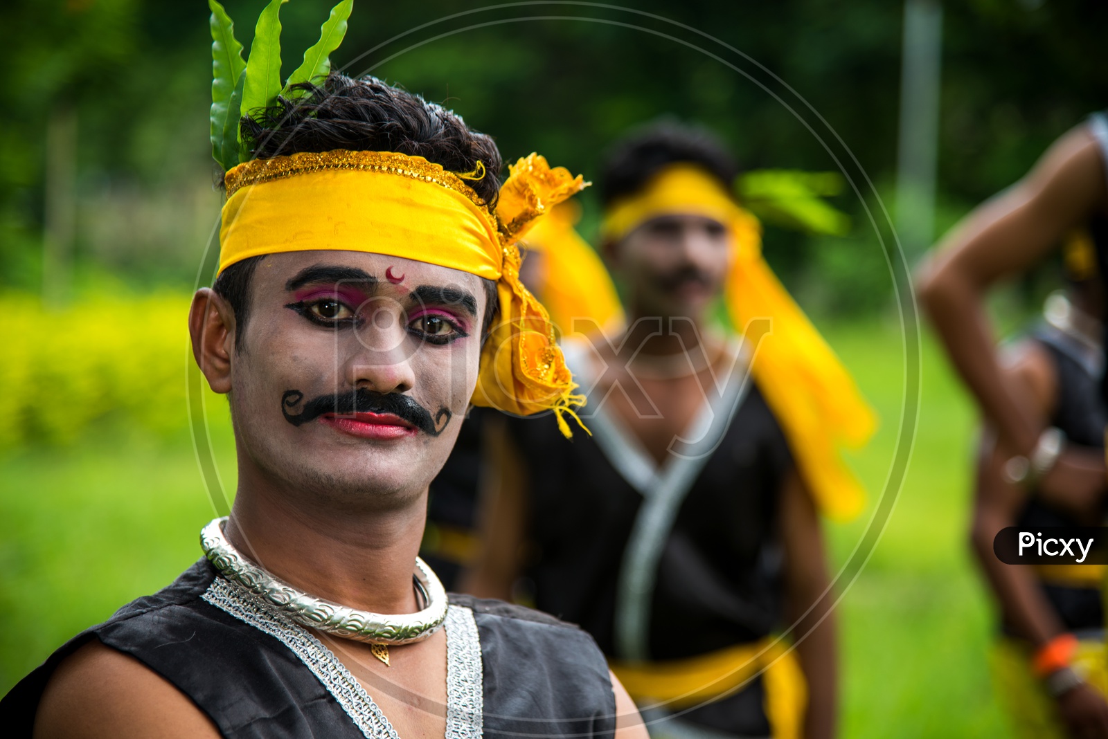 Tribal Man Wearing Tribal Dress And Performing The Folk Dance At World  Tribal Day Celebrations in Amravathi