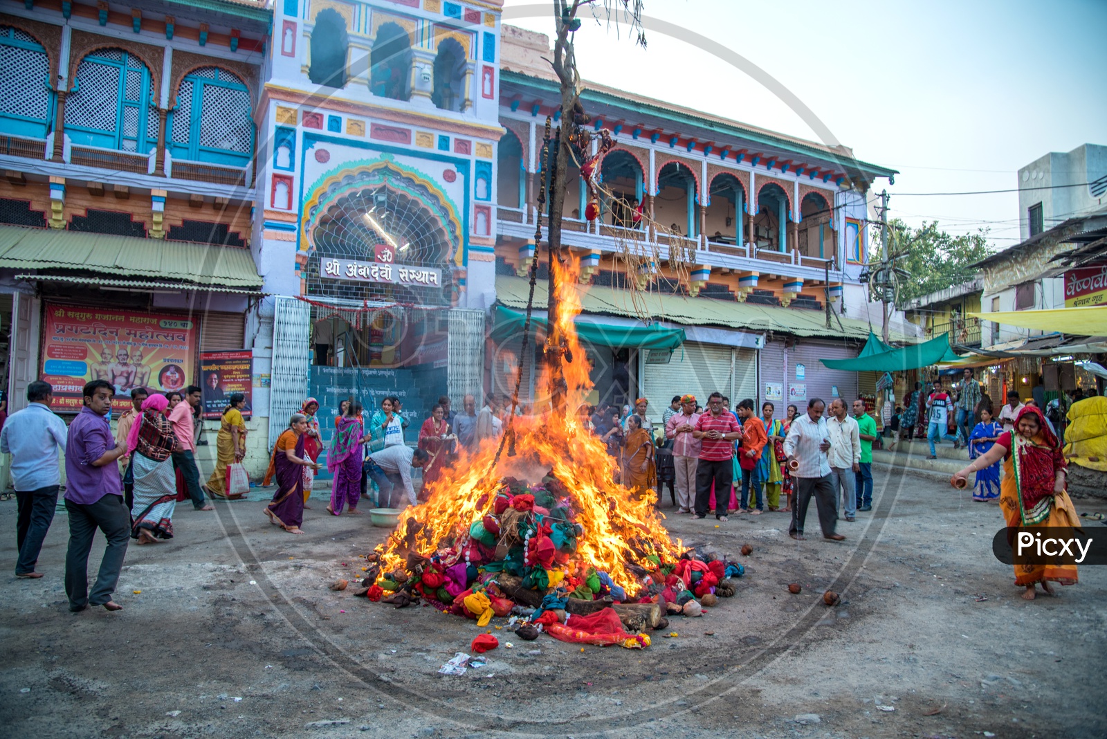 Image Of Indian People Celebrating Holika Dahan A Worship By Firing ...