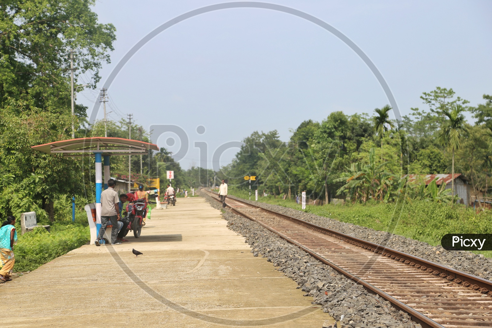 Image Of Empty Tracks In Rural Village Railway Stations With Passengers ...