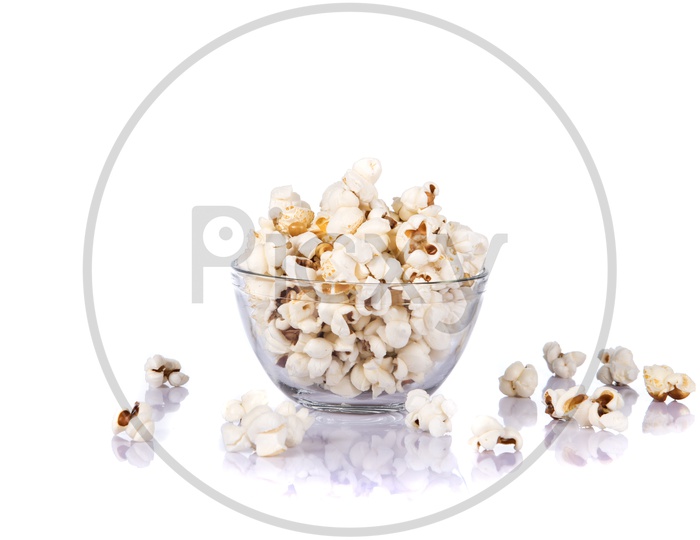 Freshly Popped Salty  Popcorn In a Bowl on an Isolated White Background