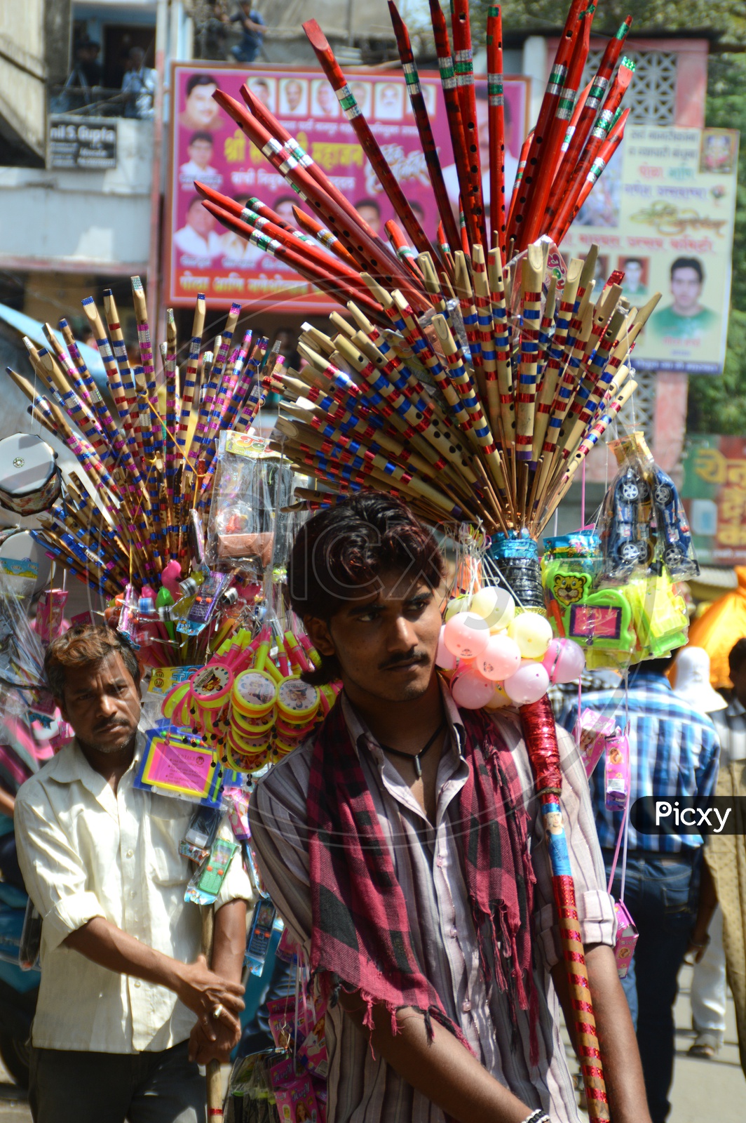 A Flute Vendor On The Streets Of Nagpur During Marbat Procession